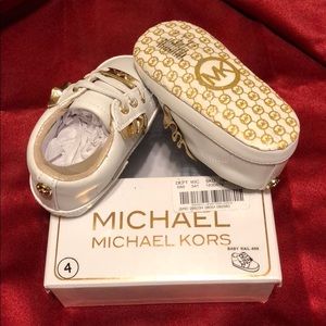 Michael Kors - gold and white baby tennis shoes